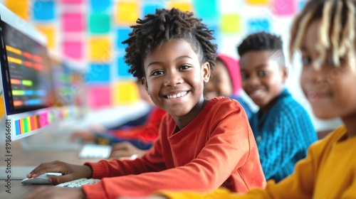 Joyful African Junior High Students Engaged in Computer Class Activities