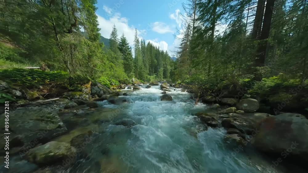 Flight over a mountain river. Shot on FPV drone. Tatra Mountains, Slovakia. Flight over a mountain river. Shot on FPV drone. Tatra Mountains, Slovakia.