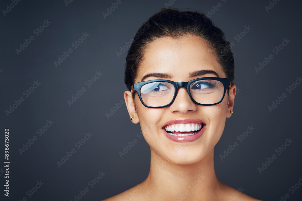 Glasses, thinking and student or girl in studio with solution in education, learning or knowledge. Excited, young and intelligent or smart person for vision, mindset or scholarship on dark background Glasses, thinking and student or girl in studio with solution in education, learning or knowledge. Excited, young and intelligent or smart person for vision, mindset or scholarship on dark background