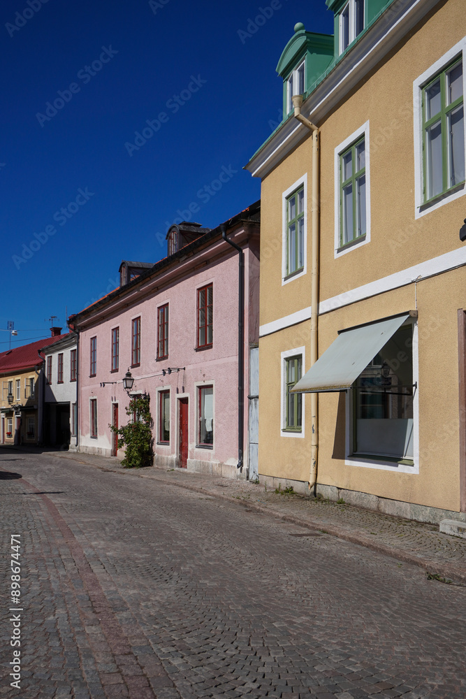 View of a empty city street during summer in Vadstena View of a empty city street during summer in Vadstena