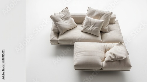 A white sectional sofa with four pillows, photographed from above on a white background. Generative AI