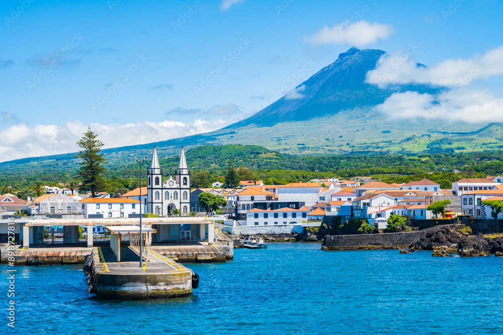 View of Madalena port and volcano on coast of Pico island, Azores, Portugal