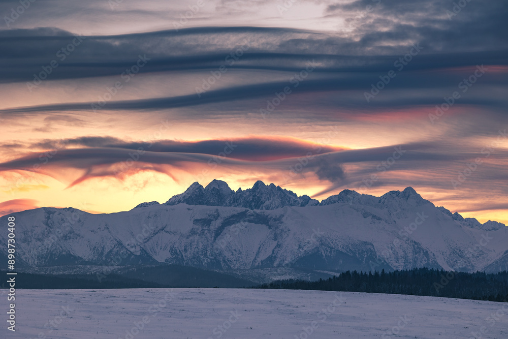 Winter views of the Tatra peaks seen from the Polish side. The Tatra National Park in its winter attire makes an incredible impression. Winter views of the Tatra peaks seen from the Polish side. The Tatra National Park in its winter attire makes an incredible impression.