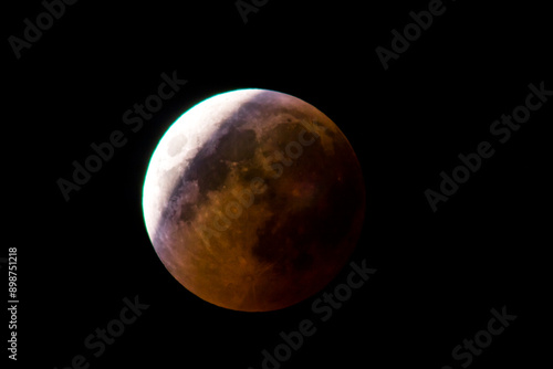 Partial lunar eclipse in the dark