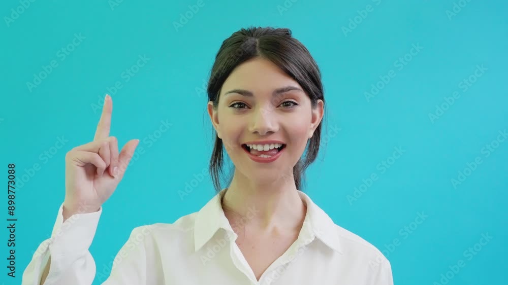 Engaging Tutorial Featuring Young Woman Smiling Against Bright Blue Background Engaging Tutorial Featuring Young Woman Smiling Against Bright Blue Background