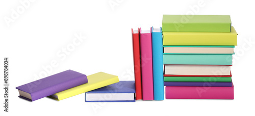 Many bright colorful books isolated on white