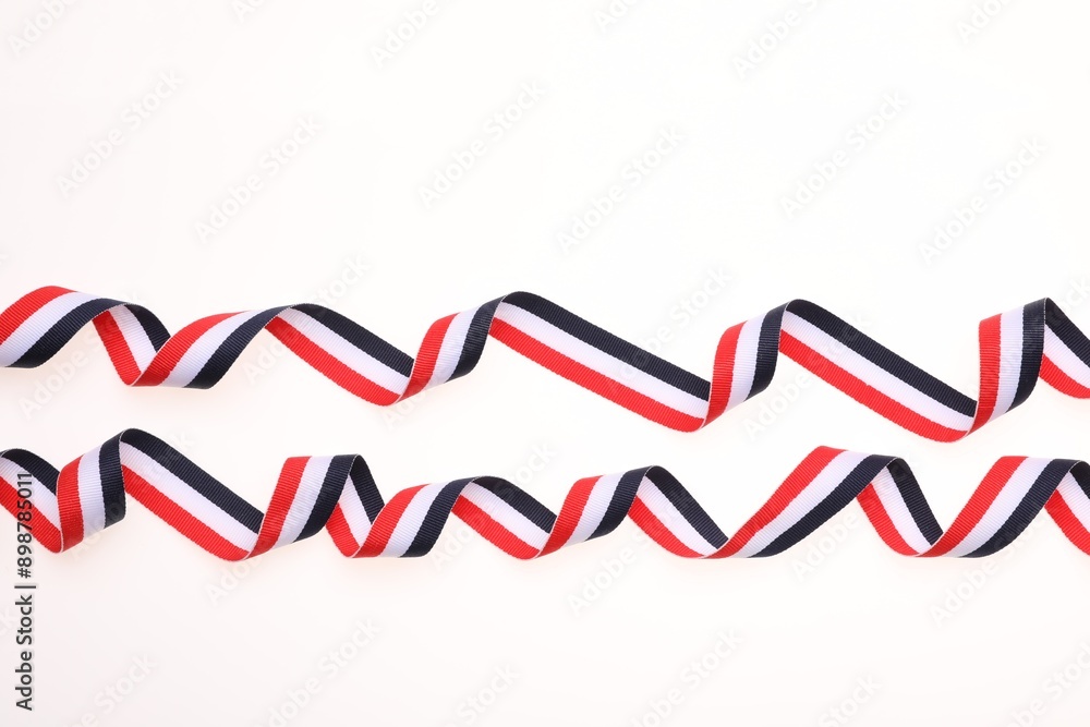 Ribbon in colors of Yemeni flag isolated on white, top view Ribbon in colors of Yemeni flag isolated on white, top view