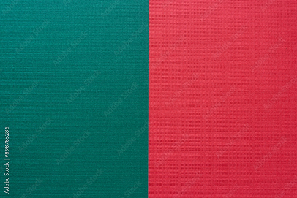 textured dark green and rich red paper background