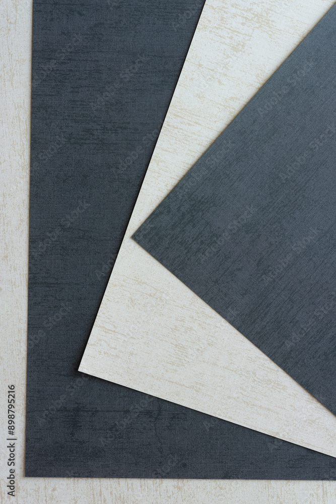 Fototapeta premium dark charcoal gray and texture beige scrapbooking paper sheets overlapping