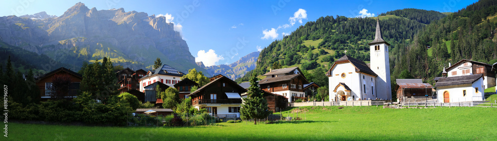 Idyllic Switzerland scenery . Traditional beautiful village Inden in canton Valais. scenic panorama vith typical wooden houses and small church Idyllic Switzerland scenery . Traditional beautiful village Inden in canton Valais. scenic panorama vith typical wooden houses and small church
