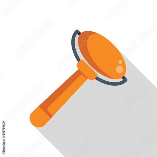 Orange lint remover being used to remove unwanted material from fabric