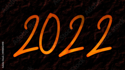 3D fire text effect of number 2022 on dark background. 