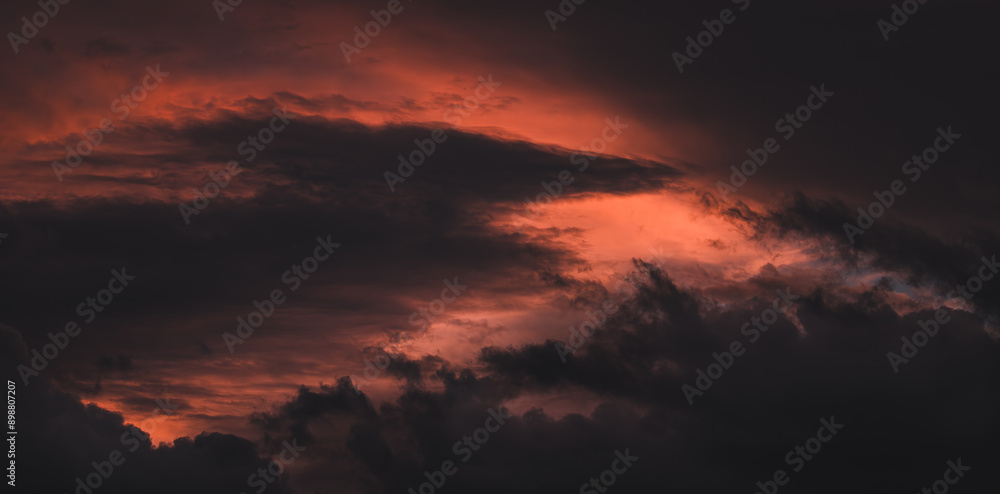 Dramatic sunset sky background. Vivid orange clouds. Dramatic sunset sky background. Vivid orange clouds.