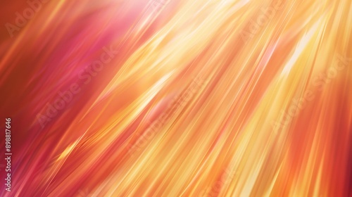 Warm hued abstract background with diagonal lines converging towards a bright focal point photo