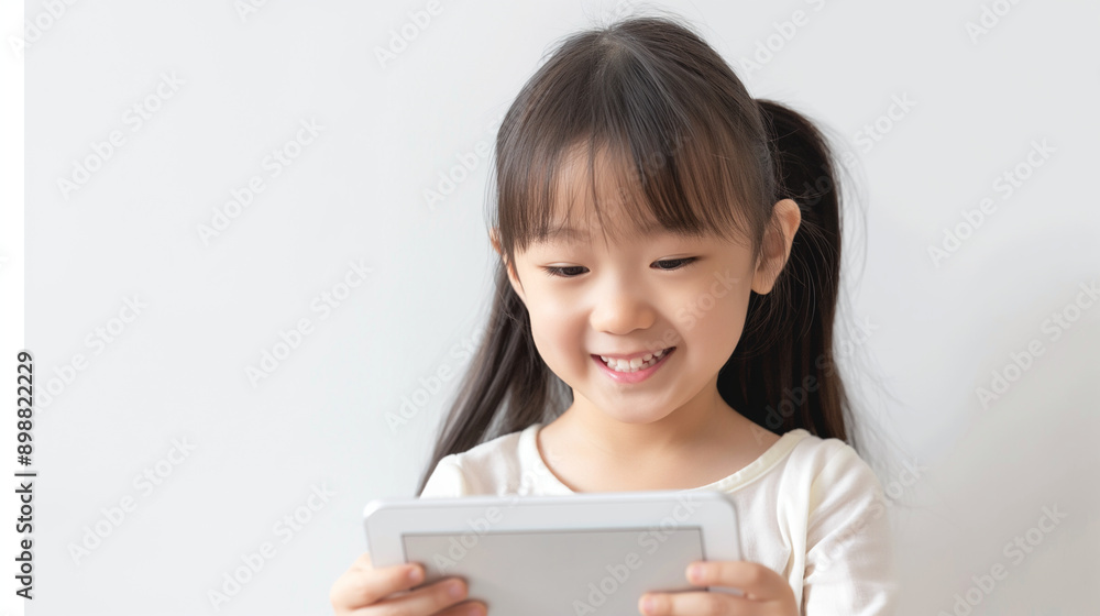 Feature our language learning app, with a smiling Asian girl using a tablet on a plain white background. Feature our language learning app, with a smiling Asian girl using a tablet on a plain white background.