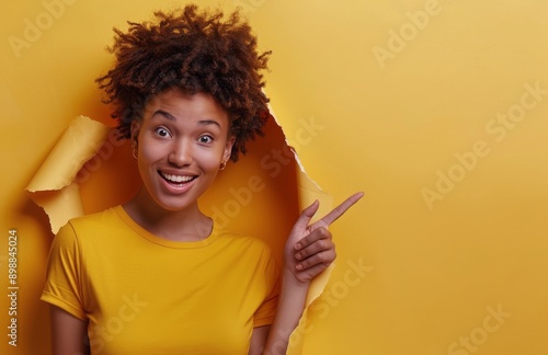 Portrait of a Smiling Young Woman With Brown Hair and a Denim Shirt
