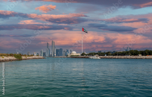 Abu Dhabi skyline and UAE flag , United Arab Emirates