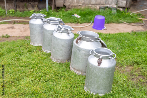 MILK CANS SKANSEN OPEN AIR FARM IN STOCKHOLM, SWEDEN.