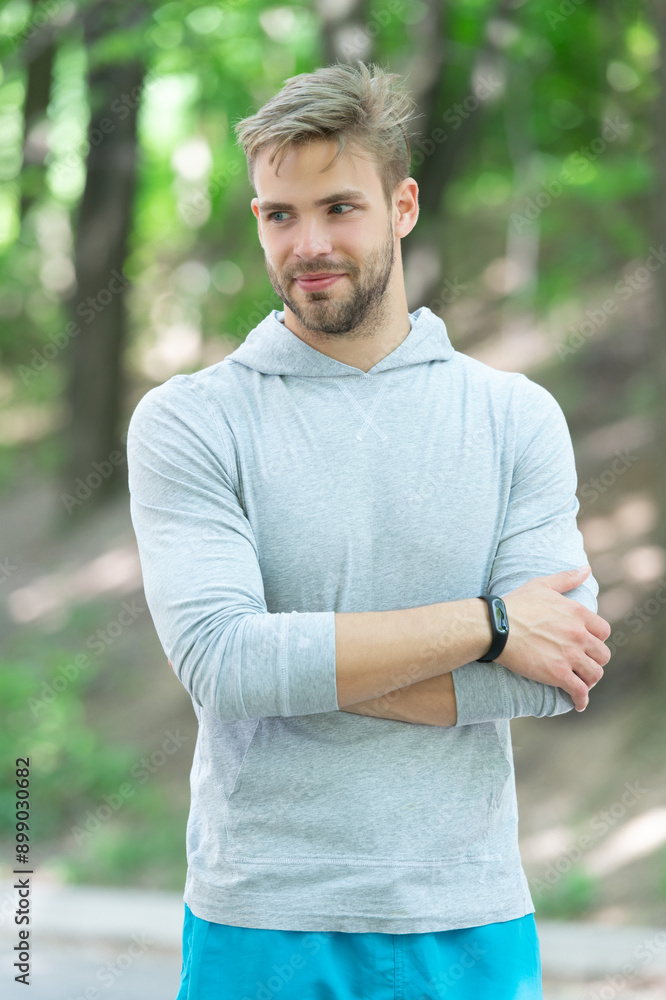 Fit and active man after workout outdoor. Smart watch. Sporty man do sport. Fitness sportswear for man. Active and healthy lifestyle. Fit your body. Sport and fitness. Young man in sportswear Fit and active man after workout outdoor. Smart watch. Sporty man do sport. Fitness sportswear for man. Active and healthy lifestyle. Fit your body. Sport and fitness. Young man in sportswear