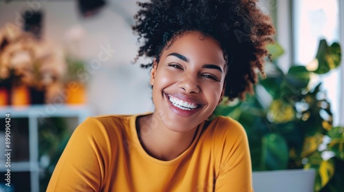 Image of young beautiful joyful woman smiling while working with laptop in office - generative ai © ImronDesign