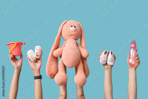 Female hands with baby acce...