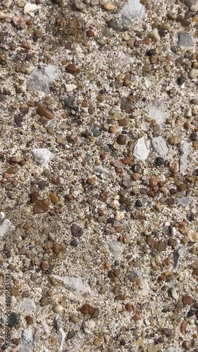 Gray stone rock raindrops appear evaporate textural closeup nature background