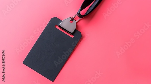 security badge lying on colorful pink background with blank