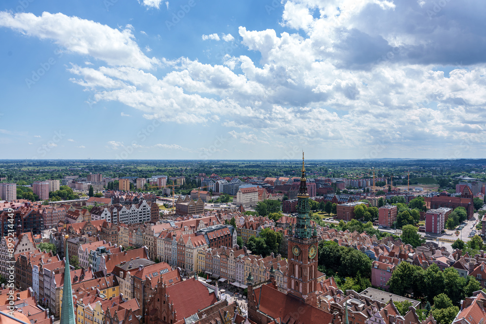 Fototapeta premium Aerial View of the Historic European Town of Gdansk, Danzig with Red Roof Buildings and Green Landscape