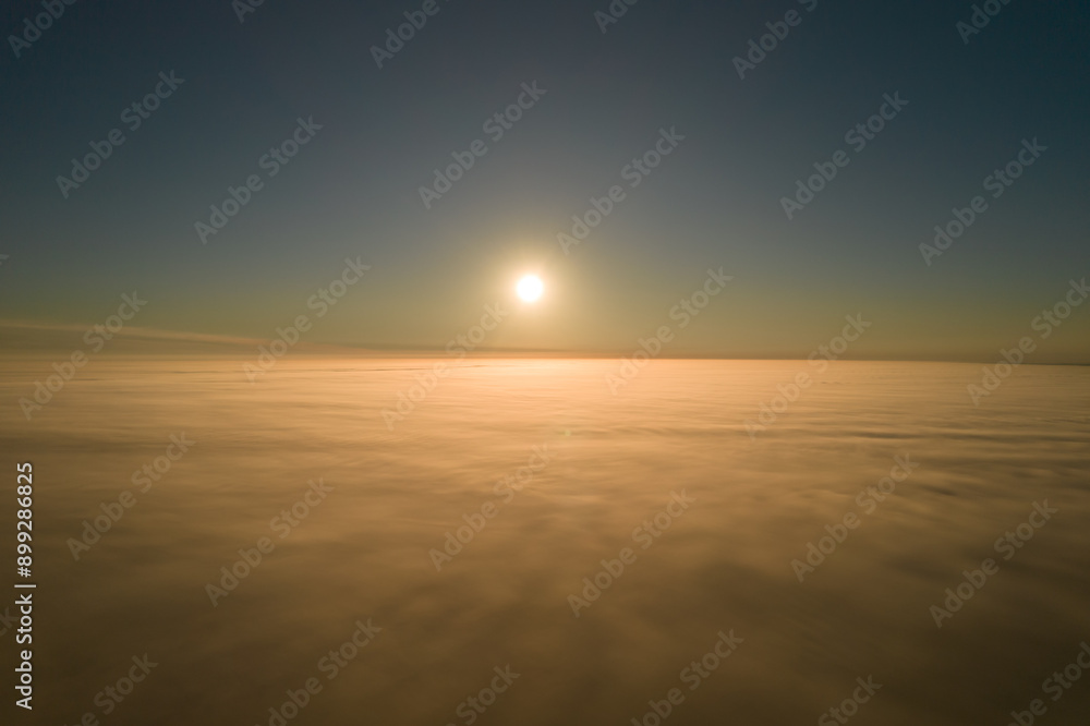 Amazing natural scenery. The camera rises out of the thick fog over a beautiful ocean of clouds at sunrise. Amazing natural scenery. The camera rises out of the thick fog over a beautiful ocean of clouds at sunrise.