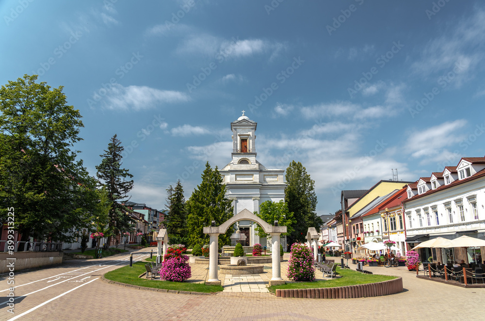Summer cityscape of Námestie svätého Egídia sqaure in Poprad (Spiš, northern Slovakia, near High Tatra Mountains) famous for its historic centre and as a holiday resort.