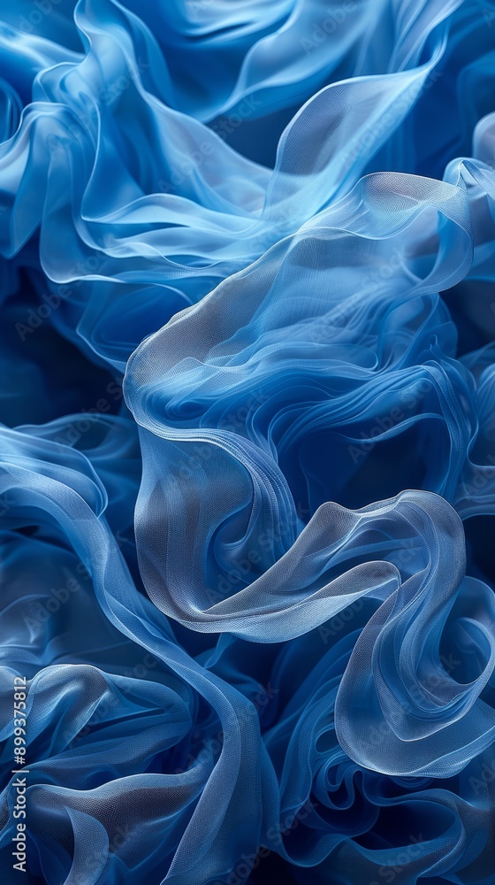 Fototapeta premium A tight shot of blue fabric featuring an expansive wave-like section in its center