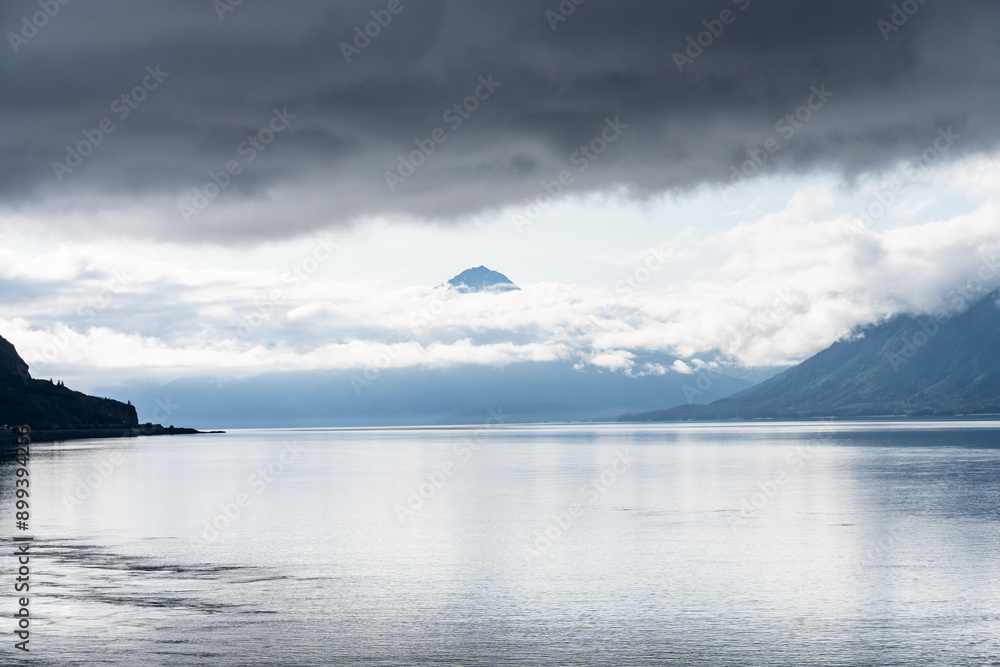 Turnagain Arm, It is one of two narrow branches at the north end of Cook Inlet, the other being Knik Arm. Turnagain is subject to climate extremes and large tide ranges. Kenai Mountains.
