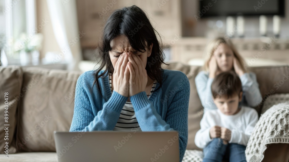 The distressed woman on laptop The distressed woman on laptop