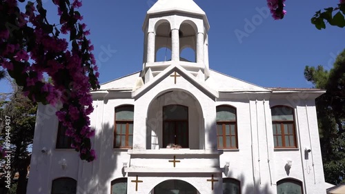 ISTANBUL, TURKEY - JULY 14, 2024: An aesthetically taken photograph of the exterior of Surp Krikor Lusavoriç Church on Kınalıada in the summer. photo