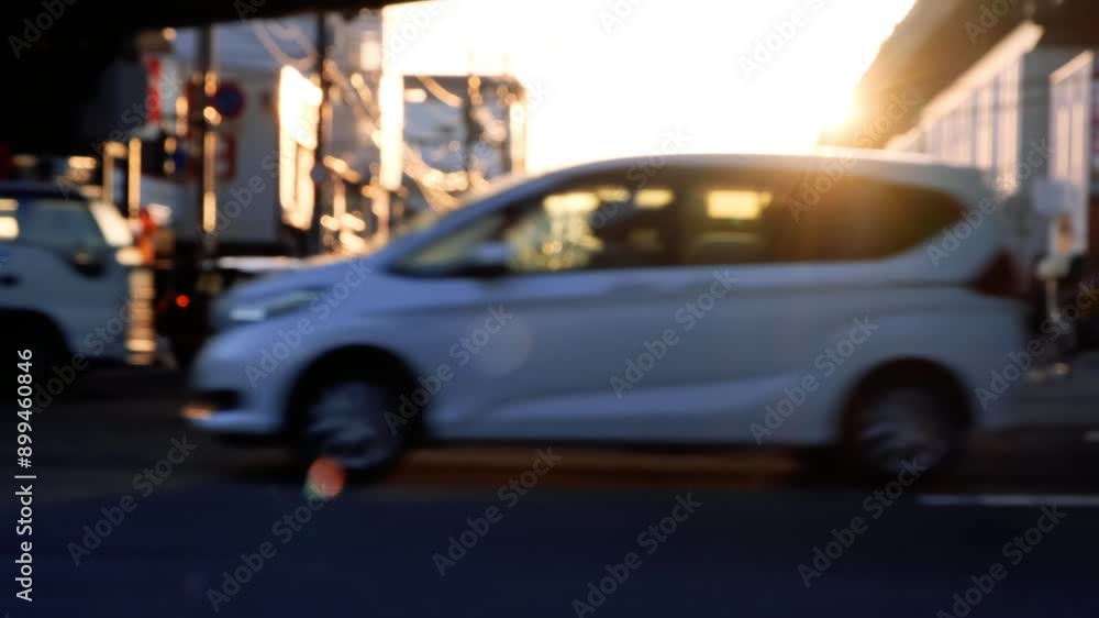 Cars and vehicles move in traffic during rush hour in the city. Cars and vehicles move in traffic during rush hour in the city.