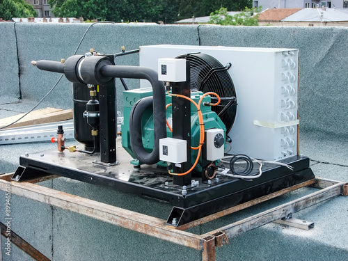Industrial cooling unit installed on a building rooftop, ready for operation