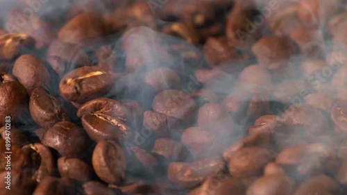 Super slow motion of flying coffee beans in speed ramping. Filmed on high speed cinema camera. morning coffee beans texture