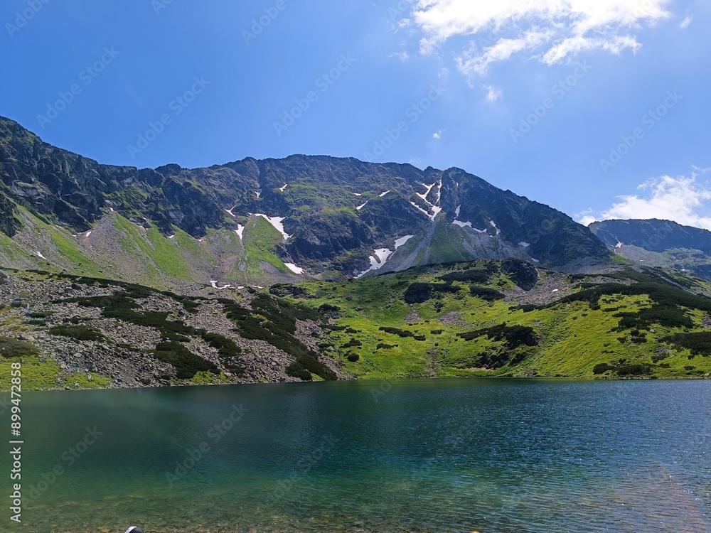 Tatry,Poland-Dolina Pięciu Stawów:15.07.2023. A lovely view of the Tatra mountains and the valley of five ponds. Tatry,Poland-Dolina Pięciu Stawów:15.07.2023. A lovely view of the Tatra mountains and the valley of five ponds.