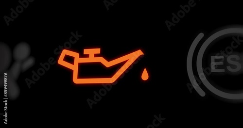 Low oil pressure warning light of car dashboard, oil funnel icon indicator, close-up, footage