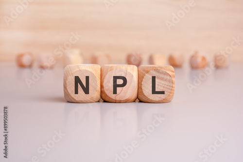 Wallpaper Mural the letters NPL is written on wooden cubes Torontodigital.ca