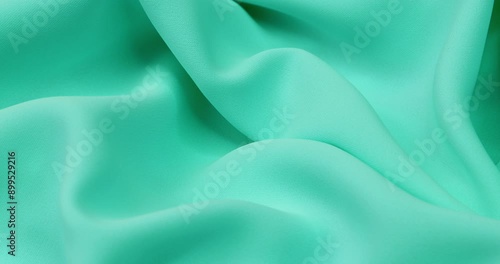 Wallpaper Mural Closeup rotating shot of textured light-blue toned fabric with large and deep pleats Torontodigital.ca