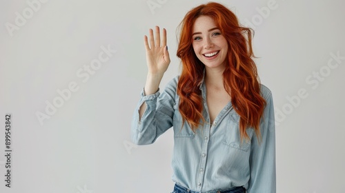 The smiling redhead woman photo