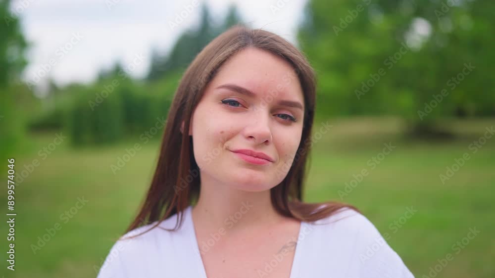 Young Family Picnic Pregnant Mom white dress and Twins.Happy pregnant mom smiles and walks in the park with twins. Green grass and trees. Happy family enjoying summer holidays.
Happy Mom Smile.
