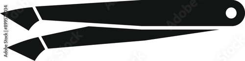 Black metal tweezers for eyebrow correction lying open, beauty and fashion concept