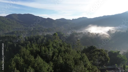 Mountain valley during sunrise. Natural summer landscape photo