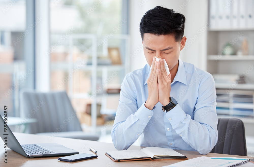 Business, laptop and Asian man at desk, sneeze and tissue for allergy, disease and illness in office. Person, employee and consultant with computer, sick and cold with virus, covid and blowing nose Business, laptop and Asian man at desk, sneeze and tissue for allergy, disease and illness in office. Person, employee and consultant with computer, sick and cold with virus, covid and blowing nose