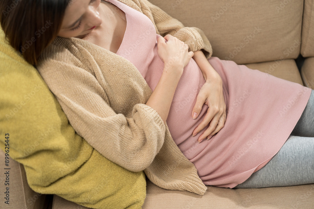 Young pregnant woman suffering stomach from abdominal pain alone female feel abnormal painful contraction during pregnancy, accidental medical urgency case and health care insurance for pregnancy. Young pregnant woman suffering stomach from abdominal pain alone female feel abnormal painful contraction during pregnancy, accidental medical urgency case and health care insurance for pregnancy.