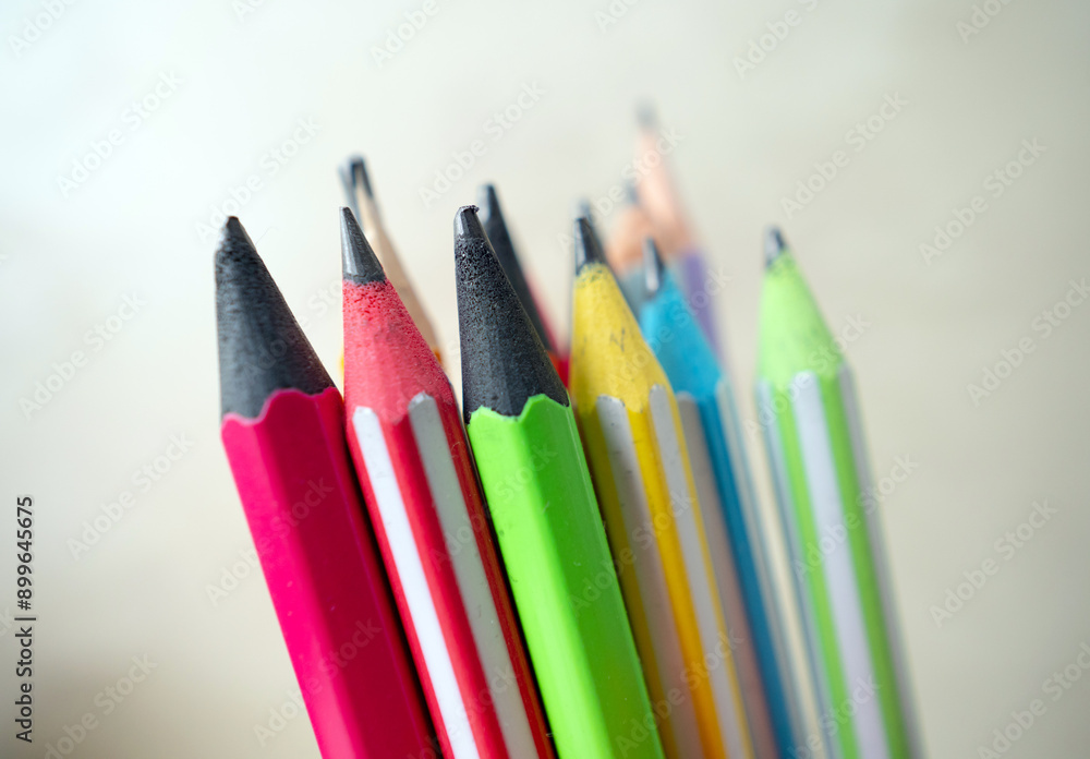 Multi-colored pencils close-up. Macro children's pencil. Multi-colored pencils close-up. Macro children's pencil.