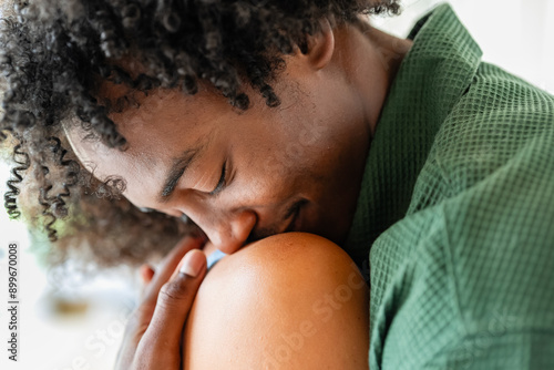 Canvas Print Close up photo of a young cheerful couple of African descent having an intimate