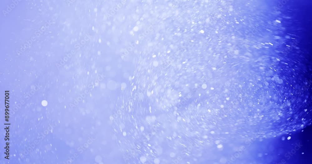 Ethereal Glittery Bokeh White Particles On Blue Background Ethereal Glittery Bokeh White Particles On Blue Background